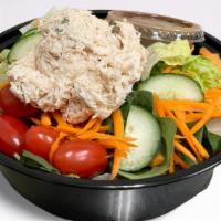 Tuna, Chicken, Or Egg Salad · green salad topped with shredded carrots, grape tomatoes, sliced cucumbers, and a scoop of o...