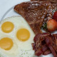 Three Stooges  · 3 eggs any style, 3 pieces of any one breakfast meat, and 3 waffle halves, 3 pieces of Frenc...