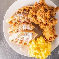 Wings & Waffles  · Maple glazed wings over a Belgian waffle with 2 eggs any style.