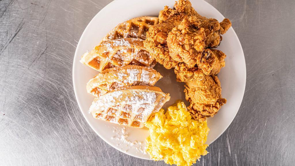 Wings & Waffles  · Maple glazed wings over a Belgian waffle with 2 eggs any style.