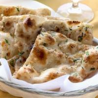 Garlic Naan · Leavened bread with garlic & cilantro.