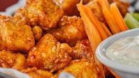12 Boneless Wings · Hand breaded, and tossed in sauce(s) of your choice. Served with bleu cheese dressing, celer...