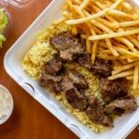 Steak Tip · Served with fries, rice & salad.