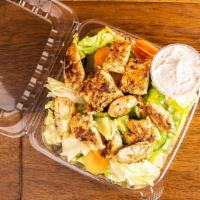 Grilled Chicken Salad · Lettuce, red onions, cucumbers, eggs, tomatoes and green peppers.