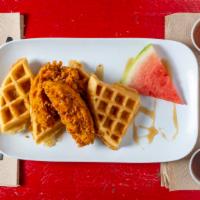 Chicken & Waffles · Extra crispy buttermilk marinated chicken, golden waffle, bourbon maple syrup, slaw. Top it ...