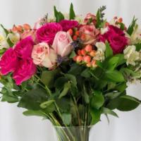 Seasonal Flowers Arrangement  · In a vase or delicately wrapped.