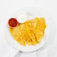 Quesadillas · FILLED WITH CHEESE. SERVED WITH SALSA AND SOUR CREAM