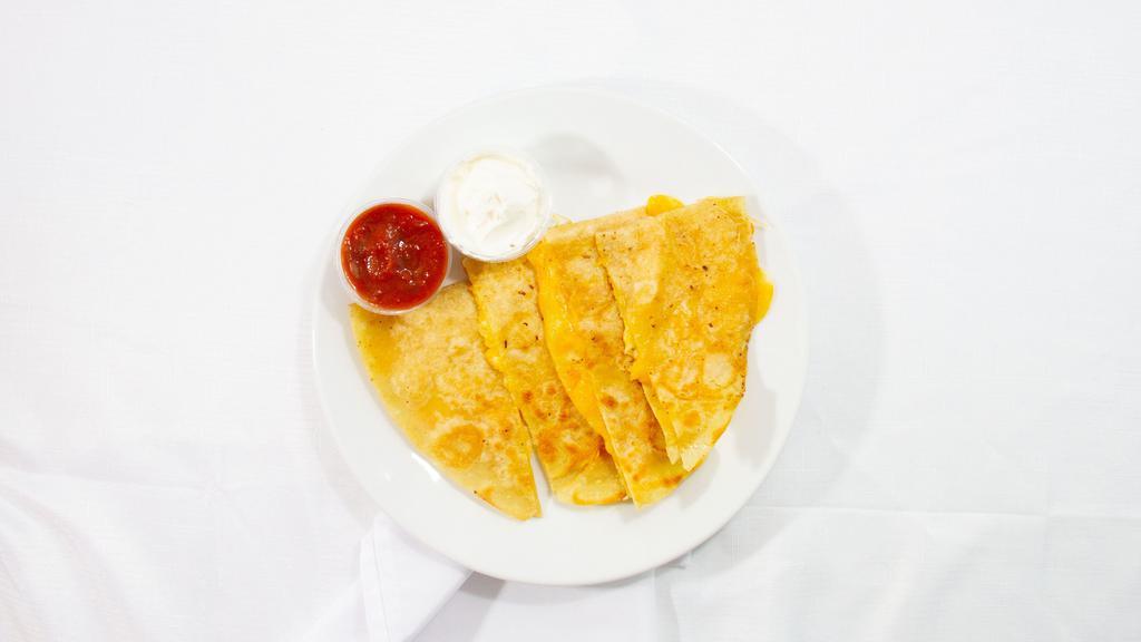 Quesadillas · FILLED WITH CHEESE. SERVED WITH SALSA AND SOUR CREAM