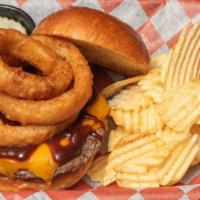 Cannon Smokehouse Burger · Mixed cheddar cheese, barbecue sauce and fried onion straws.