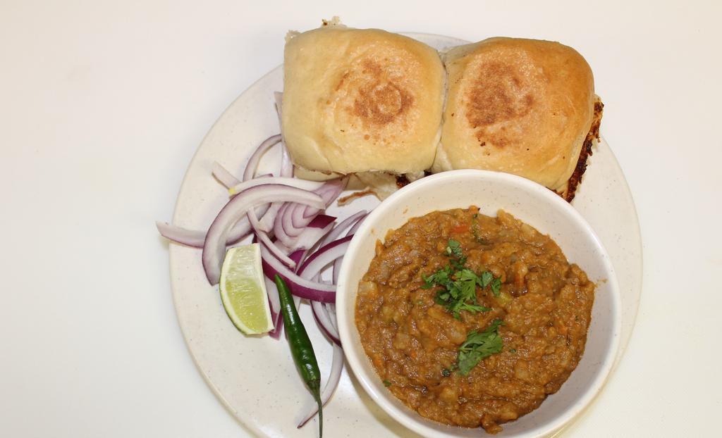 Pav Bhaji (2) · Vegetarian. Specially mixed veggies mixed with homemade spices. Served with special kind of bread (pav).