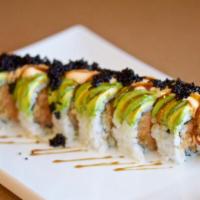 Black Caterpillar Maki · Spicy tuna topped with layer of avocado, spicy mayo, eel sauce and black tobiko.