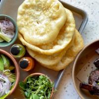 Short Rib + Fry Bread Tacos (Serves 2, Build-Your-Own) · Dry-aged local Roseda Farm carne asada-style short ribs, smoked and braised, served with avo...