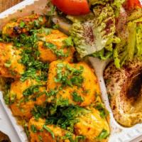 Chicken Kabab With Rice · Specially marinated in a blend of Mediterranean spices, chicken breast pieces are grilled ov...