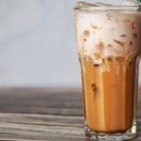 Thai Iced Tea · Sweet, strongly brewed Thai black tea. It is sweetened and served over ice.