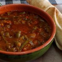 Taze Fasulye Guvec · Vegetarian, vegan. Fresh Green Bean Stew cooked with marinated tomato, onions, and peppers. ...