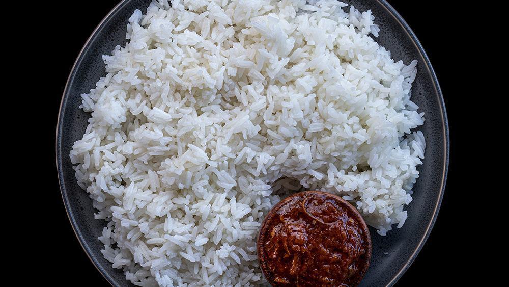  - Rice And Stew · Long Grain White Rice served with A Side of Stew.