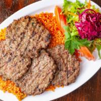 Kofte (Beef) Kebab · Char grilled Turkish meatballs served with rice.