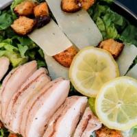 Chicken Caesar Salad · romaine lettuce, grilled chicken, shaved parmesan cheese, home made croutons & caesar dressing