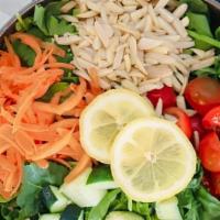 Buddah Bowl · mixed greens, carrots, cucumbers, tomato, almonds & lemon dressing.