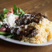 Kafta Shish Kabobs Combo Plate · Ground beef tossed in moroccan spices. Served with rice and a Mediterranean salad.