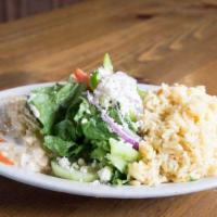 Hummus Combo Plate · Blend of ground chickpeas, garlic, lemon juice and tahini sauce. Served with rice and a Medi...