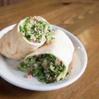 Tabouli  Roll Up · Vegetable. Served in fresh pita bread with hummus, Parsley, pickles and our tahini sauce.