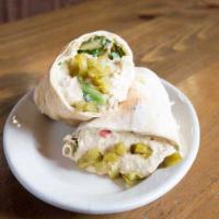 Hummus  Roll Up · Blend of ground chickpeas, garlic and lemon juice with tahini sauce. Served in fresh pita br...