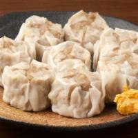 Shumai · Delicious and authentic dish made with shrimp and pork.