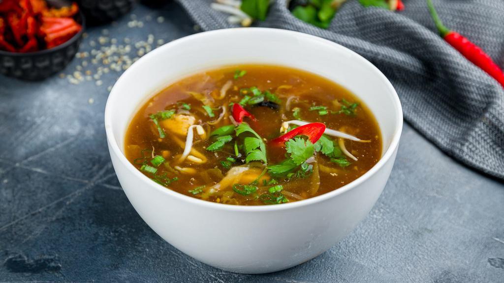Hot And Sour Soup · Bamboo shoots, chilli garlic, soy sauce, tofu, and broth.