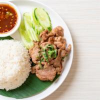 Garlic Pork With Rice · Delicious juicy marinated garlic pork, soy sauce and house spices.