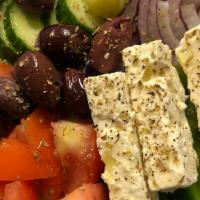Greek Salad · Feta, kalamata olives, anchovies.