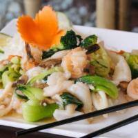 Pan Fried Rice Noodle · (Pho Ap Chao )Stir fried chow fun or crispy rice noodles and seasonal vegetables, served wit...