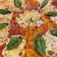 Margherita Pizza · Red pie with san Marzano tomato sauce, extra virgin olive oil, fresh basil, and sliced fresh...