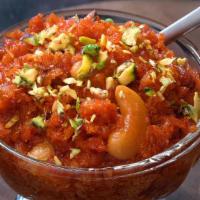 Gajar Ka Halwa · Shredded carrots cooked with milk, sugar, butter and nuts.