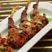 Lamb Chops · Lamb chop marinated overnight in yogurt and spices and cooked in tandoor oven.