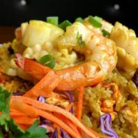 Yellow Sea Fried Rice (New) · Thai jasmine rice combined with a combination of shrimp, scallop, squid, egg, onion, scallio...
