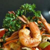 Spicy Shrimp Salad** · Shrimp with red onion, scallion, cilantro, carrot, lettuce, and cashew nuts in Thai spicy li...