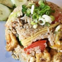 Thai Fried Rice · Choice of meat stir-fried with steamed white rice in Thai soy sauce, garlic, egg, onion, car...
