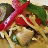 Green Curry · Medium spicy. Choice of meat in Thai green curry with Thai eggplant, bell pepper, bamboo sho...