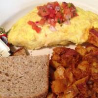 Oaxaca Omelet  · black bean, guacamole, cheese and Pico de gallo  served with home fries and wheat toast.