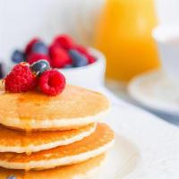 Pancakes  · cardamom or regular (stack of 3) with fresh fruit and maple syrup