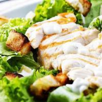 Grilled Chicken Caesar Salad · Romaine lettuce grape tomatoes croutons boiled egg and parmesan cheese.