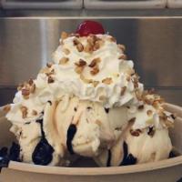 Brownie Sundae · Our decadent brownie sundae features a warm brownie or blondie topped with two scoops of you...