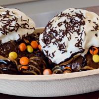 Peanut Butter Dream Sundae · Two Scoops of Chocolate PB ice cream topped with Hot Fudge & PB sauces, Reese’s Pieces, and ...