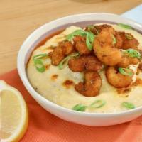 Crispy Cajun Shrimp & Grits · Jumbo fried shrimp, creamy grits, beef smoked sausage, (smoked in-house) roasted red pepper,...