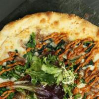 Philly Pork Pizza · White pizza with provolone, mozzarella, broccoli rabe, pulled pork shoulder, Parmesan and Ba...