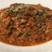 Penne Bolognese · our home made bolognese sauce made with beef and pork simmered with tomatoes and red wine, t...