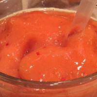 Mango-Moiselle Smoothie · Mango Juice, Strawberries, Peaches, Mango Sorbet