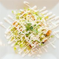 Flautas · Three crispy tacos rolls, stuffed with shredded chicken, topped with lettuce, sour cream, an...