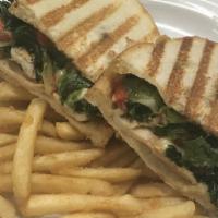 Fratelli'S Panini · Grilled chicken breast, spinach, red roasted peppers, fresh mozzarella, balsamic reduction, ...